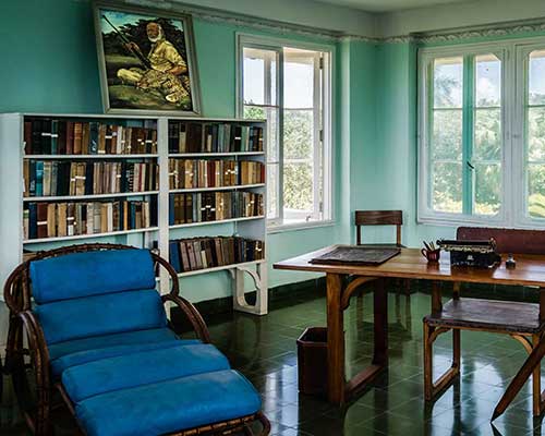 Hemingway writing in Cuba.